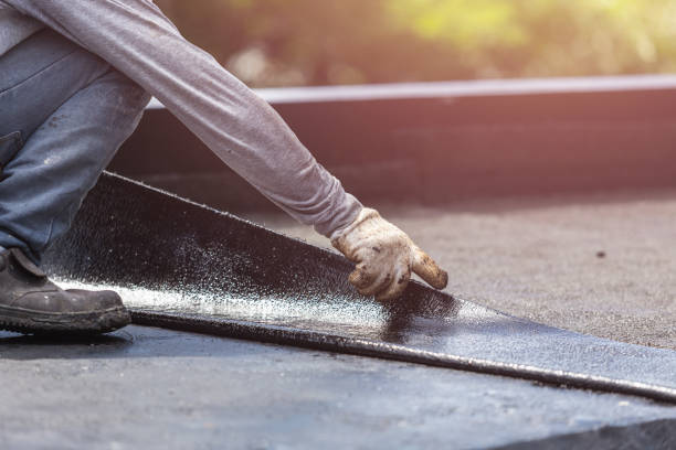 Professional Basement Waterproofing technician working in Hamlin, NY